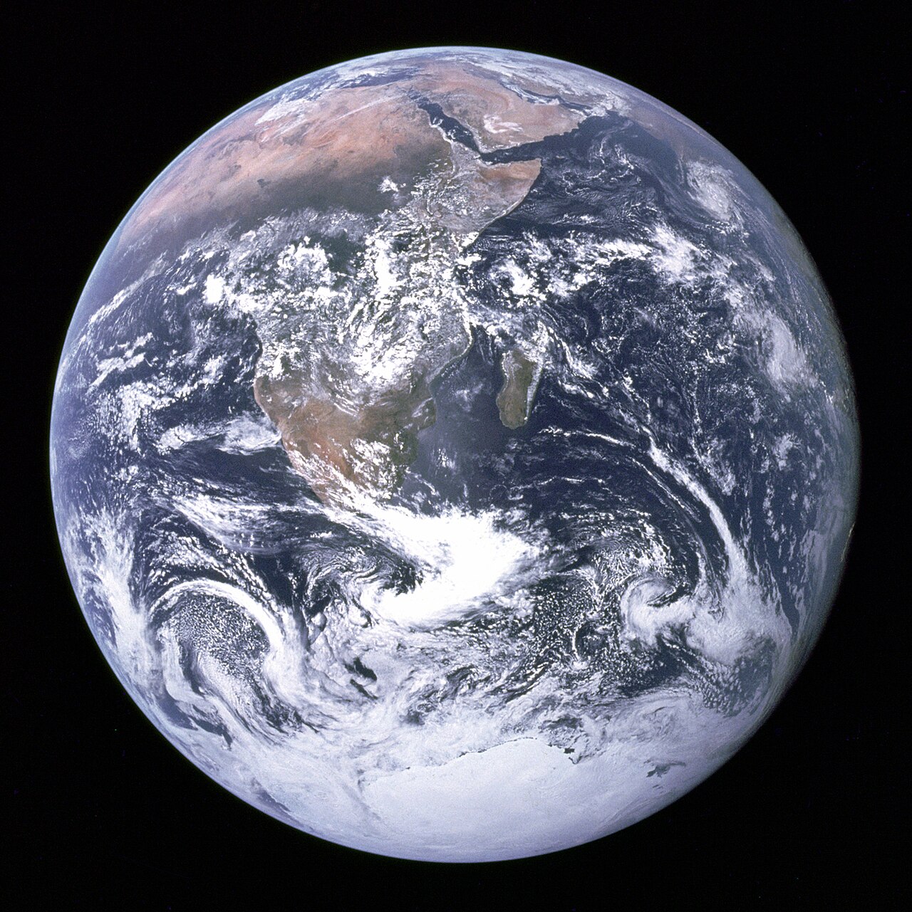 Earth seen from space, showing blue oceans and white clouds