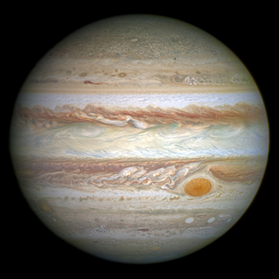 Jupiter, a banded orange planet with a large red spot