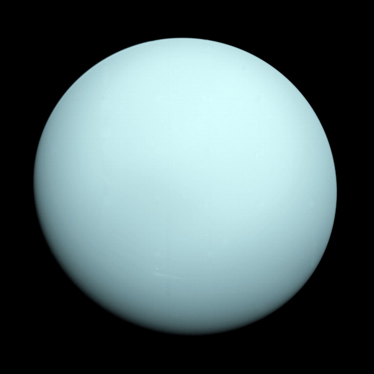 Uranus, a pale blue-green planet