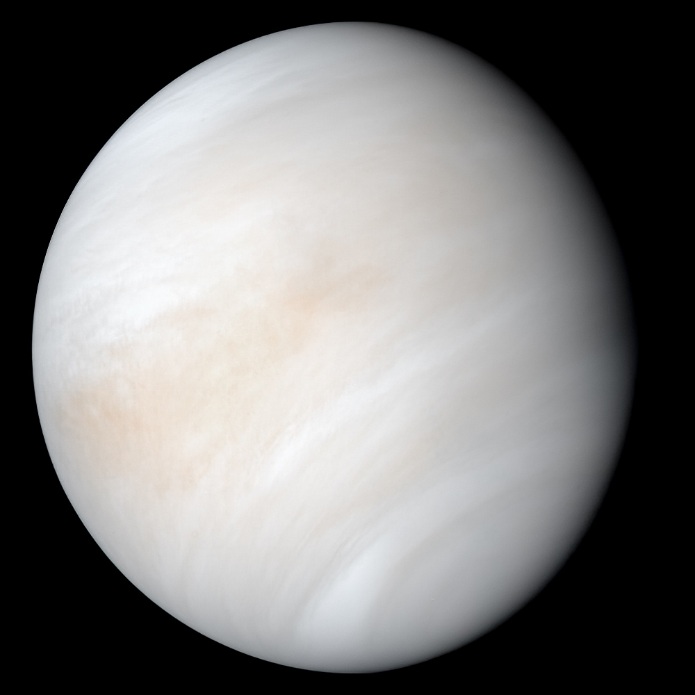Venus, a pale yellow planet covered in thick cloud